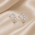 Eleganti orecchini in oro bianco con zirconi