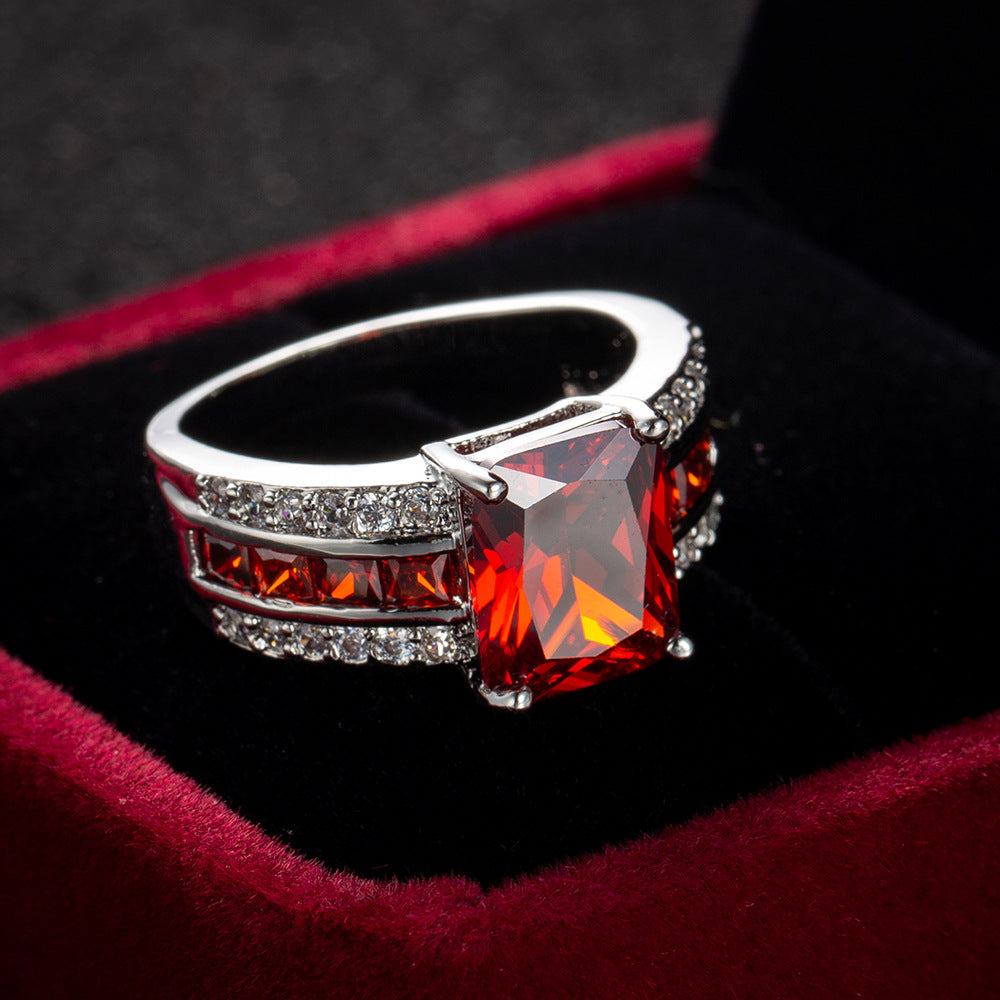 Anello in Argento con Rubino a Due Tubi