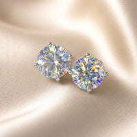Orecchini scintillanti in oro bianco con zirconia