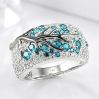 ANELLO FOGLIA IN ARGENTO CON TOPAZIO BLU