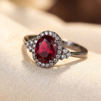 Velloria™ - Anello Halo in Argento e Rubino