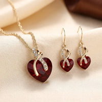 Aurevella™  - Collezione di gioielli intrecciati con cuore in oro e rubino