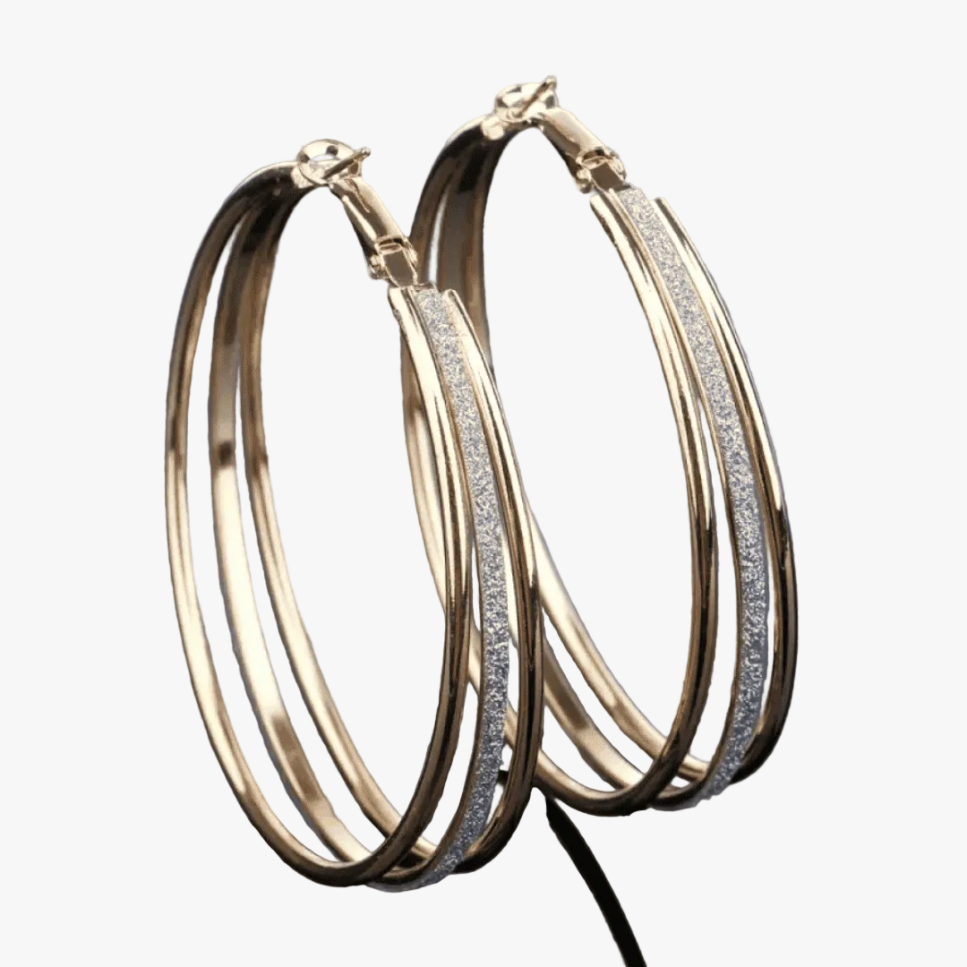 Orecchini a cerchio in oro dal design retrò