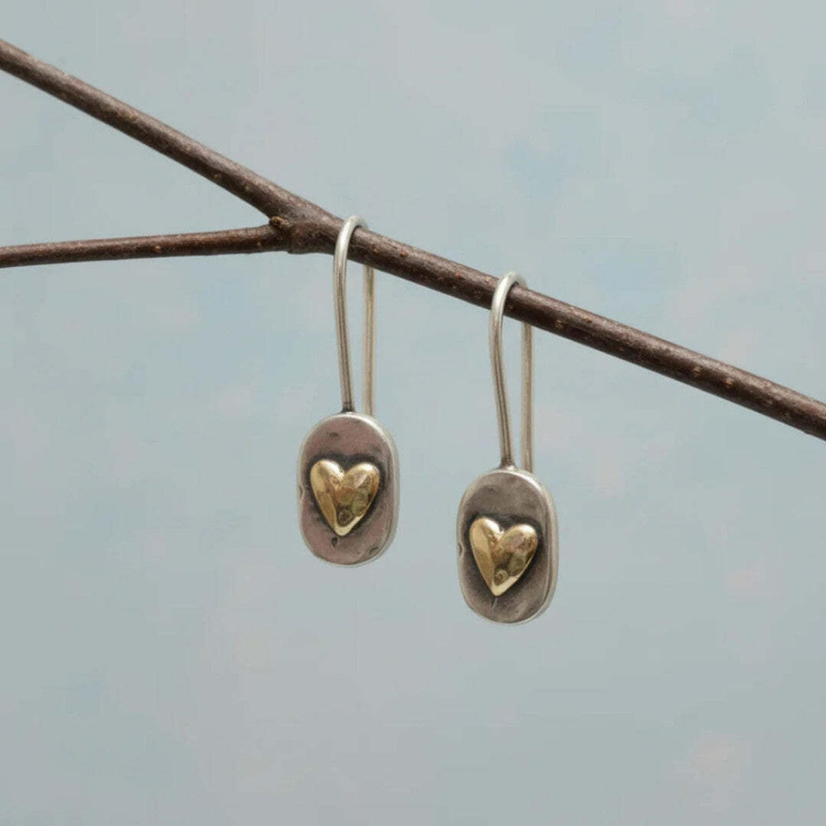 Orecchini vintage a forma di cuore con dettagli in oro