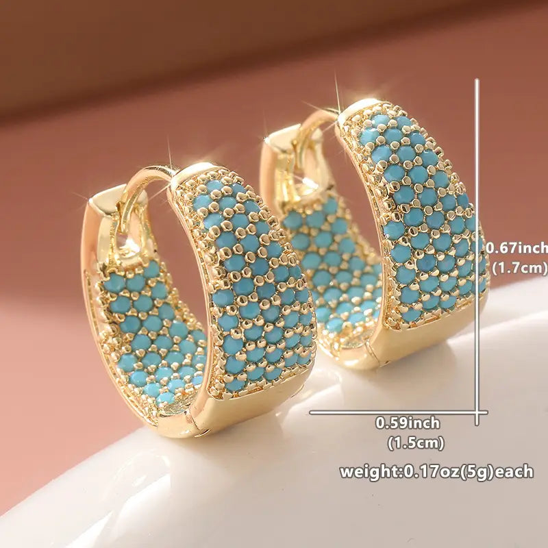 Orecchini a cerchio con perline turchesi e tonalità dorata | Oro