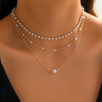 Il set di collane Trinity Pearl Layer