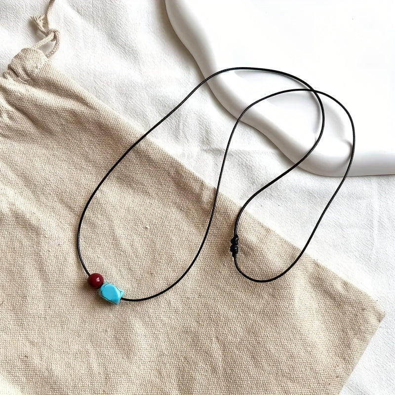 Collana con pendente in perle rotonde di turchese e cinnabro