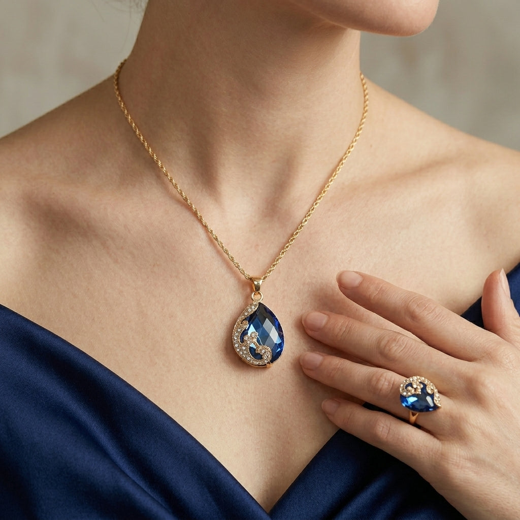 Set di collana e orecchini in oro con cristallo blu