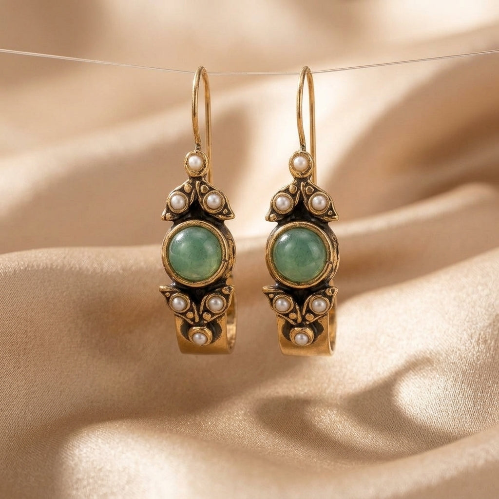 Orecchini a cerchio in perla cabochon argento classico