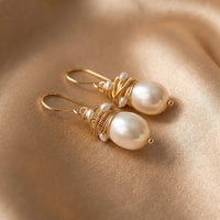 Orecchini vintage con perle e fili dorati