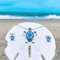 Collana e Orecchini a Tema Tartaruga Marina in Opale e Argento
