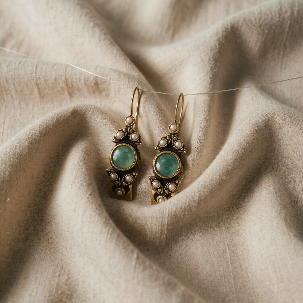 Orecchini a cerchio in perla cabochon argento classico