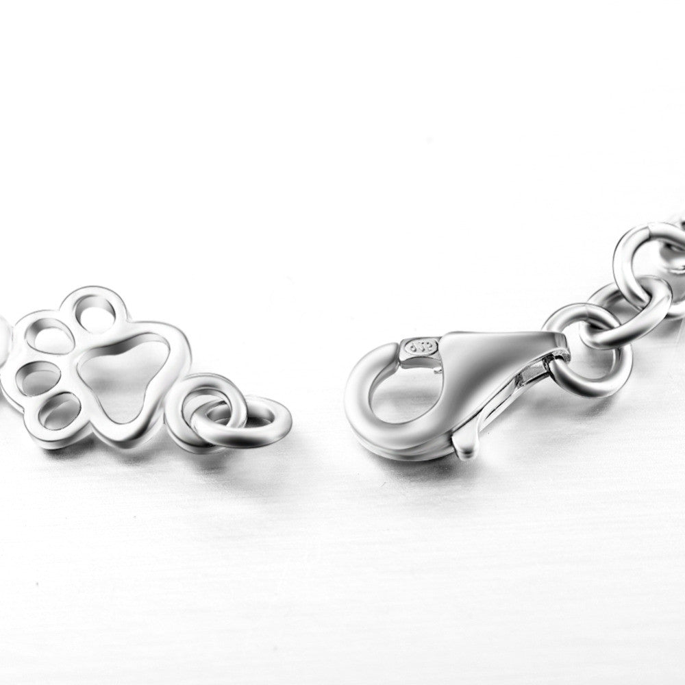 Bracciale in Argento Puro Edizione Limitata con Charm a Forma di Zampa di Cane e Osso