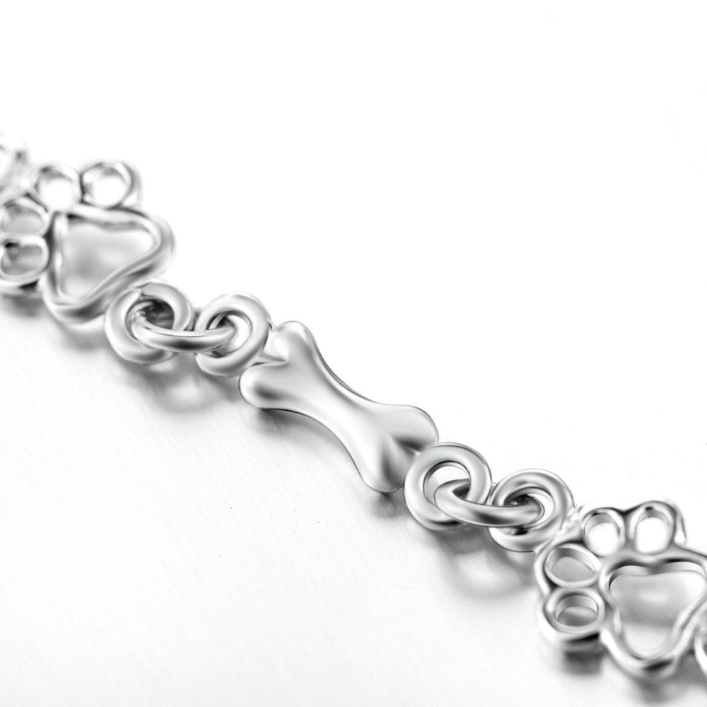 Bracciale in Argento Puro Edizione Limitata con Charm a Forma di Zampa di Cane e Osso