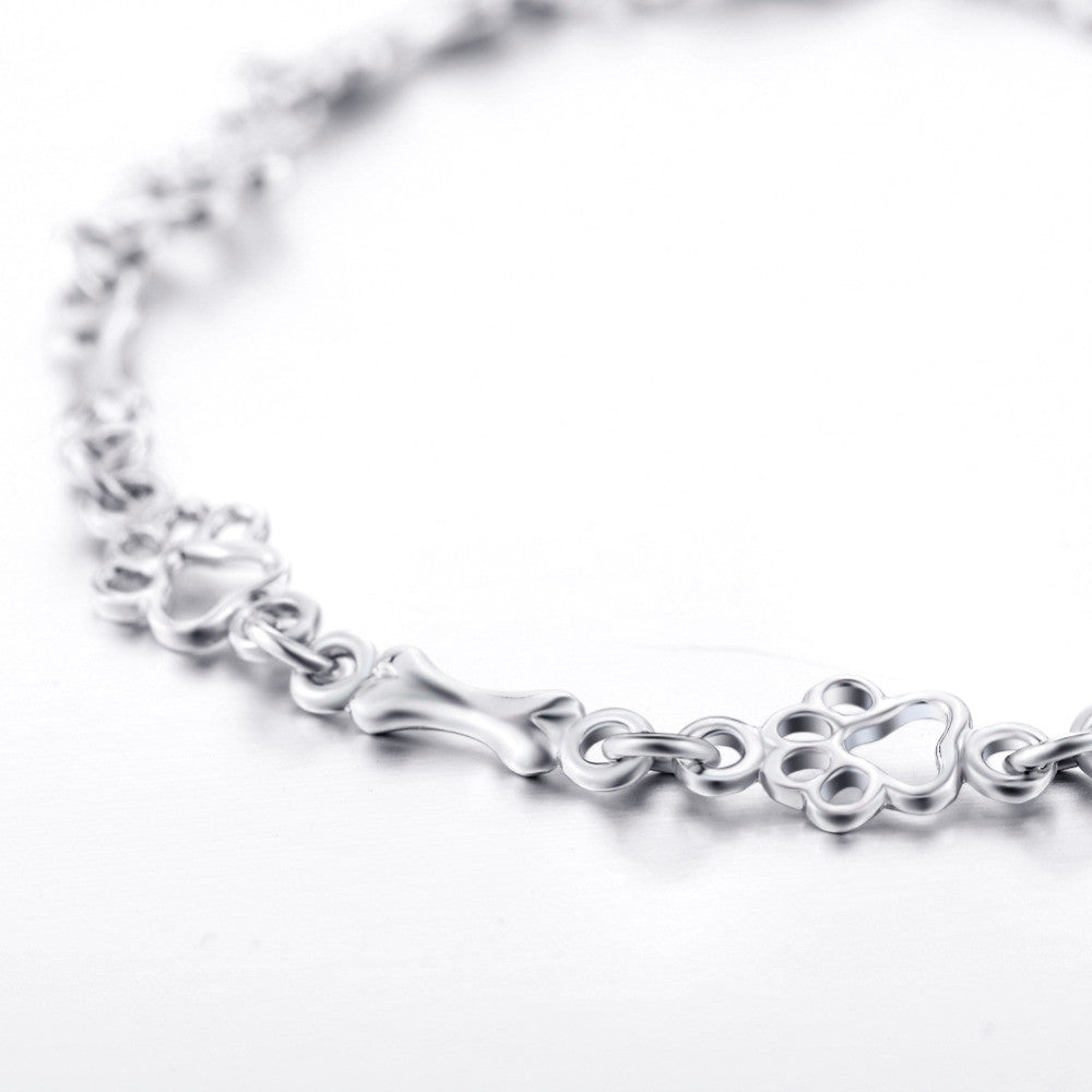 Bracciale in Argento Puro Edizione Limitata con Charm a Forma di Zampa di Cane e Osso