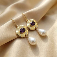 Orecchini con perle e zirconi viola