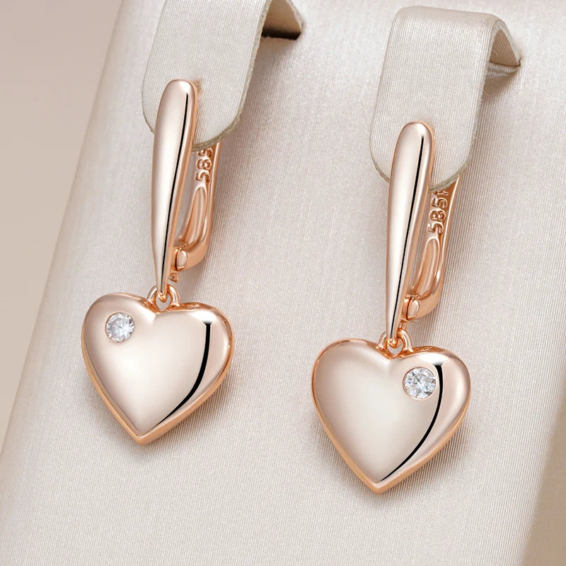 Moderne orecchini pendenti a cuore con zirconia rosa