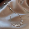 Bracciale in Oro Bianco con Zirconi a Forma di Fiore
