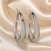 Orecchini di Lusso in Mesh di Zirconia e Oro Bianco