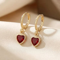 Novellia™ - Orecchini pendenti a cuore in oro con rubino