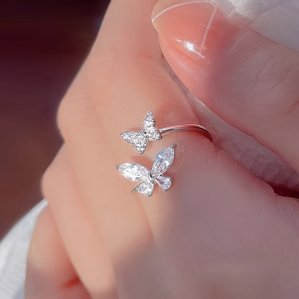 Anello in Oro Bianco con Due Farfalle in Zirconia