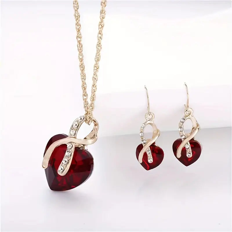 Set di Gioielli Cuore Intrecciato in Oro e Rubino