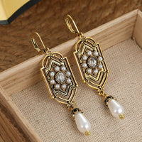 Orecchini Vintage con Perle Incastonate in Oro