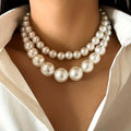 Collana con Perle a Doppio Statement