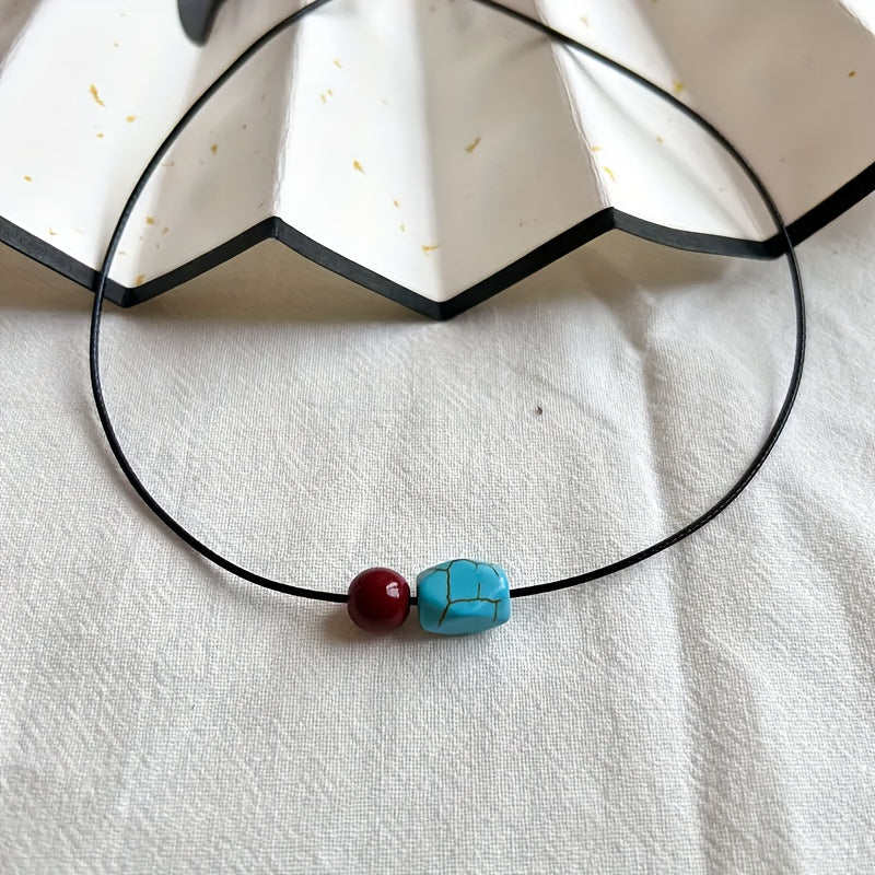 Collana con pendente in perle rotonde di turchese e cinnabro