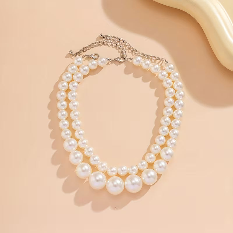 Collana con Perle a Doppio Statement