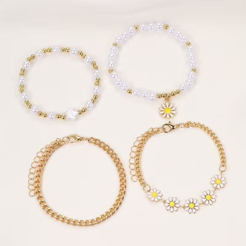 Set di 4 Bracciali Impilabili con Perle e Margherite