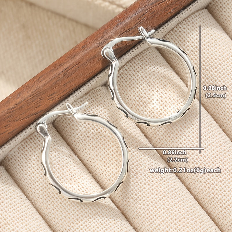 Orecchini a cerchio boho vintage con texture