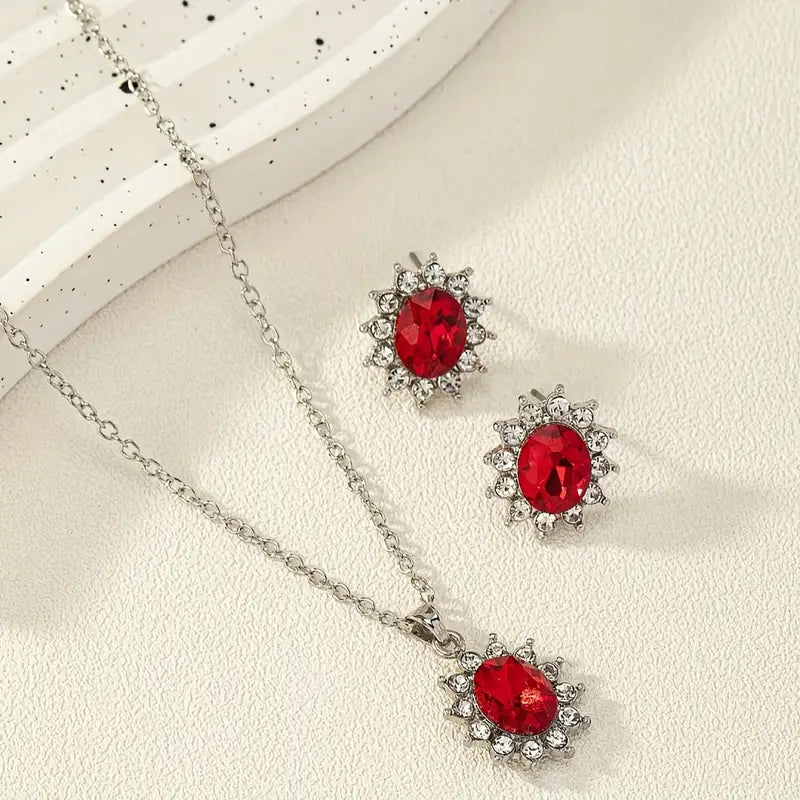 Set di gioielli in argento e rubino floreale