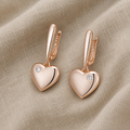 Moderne orecchini pendenti a cuore con zirconia rosa