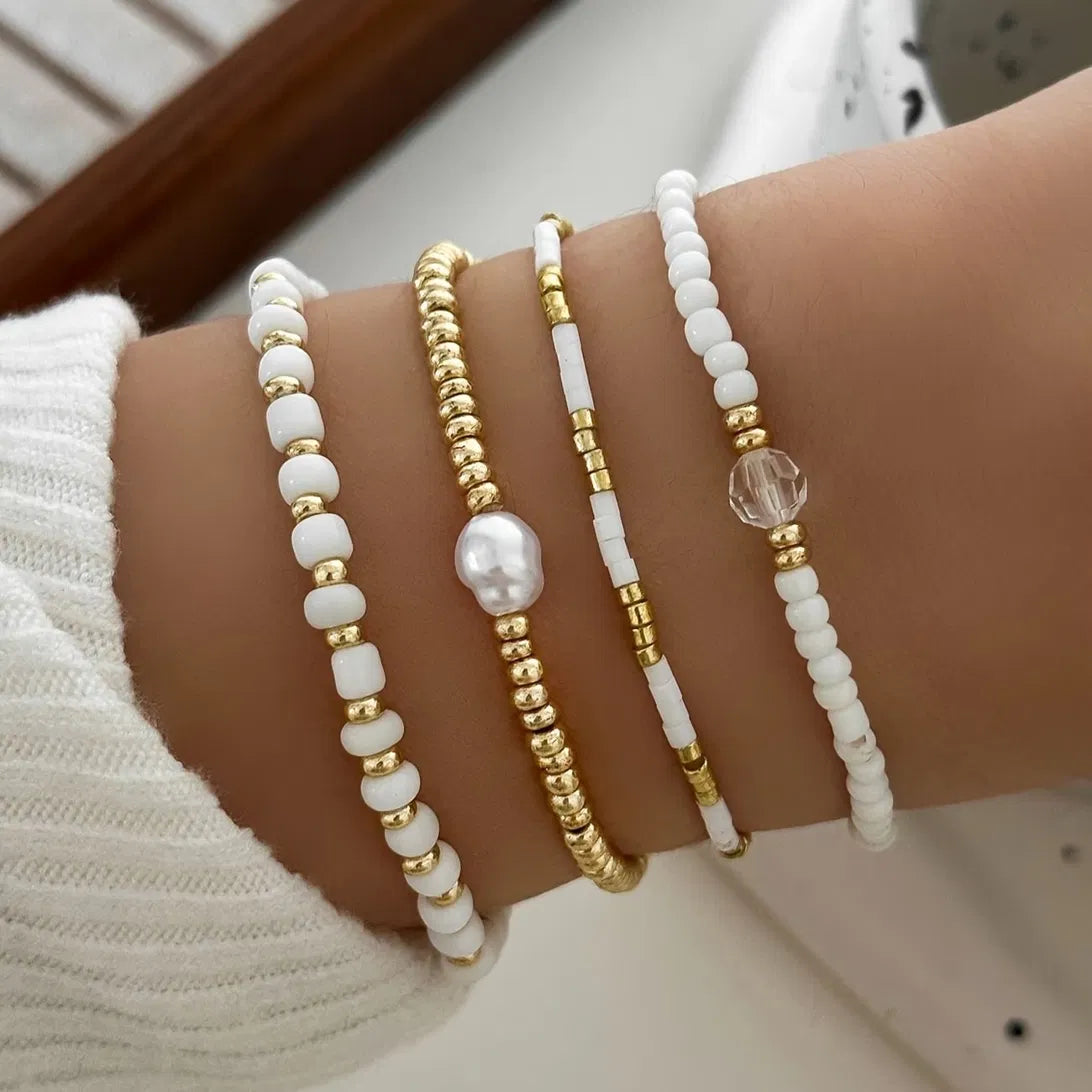Set di 4 Bracciali con Accenti di Perle Dorate