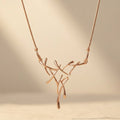 Collana con ramo di corna in oro rosa Boho
